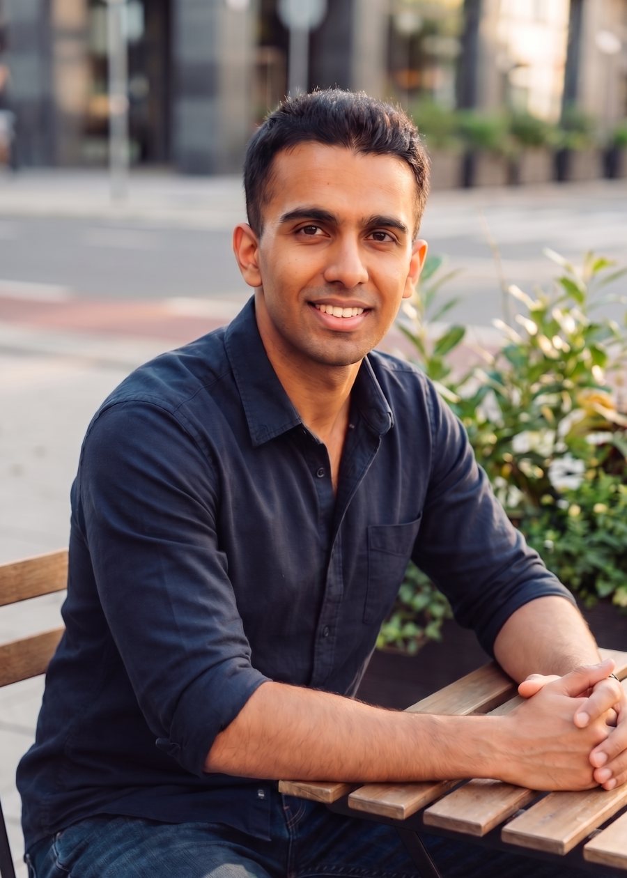 Dhananjay Tomar sitting and looking at the camera.